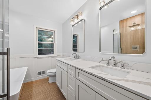 Main level bath (full) located just off primary bedroom