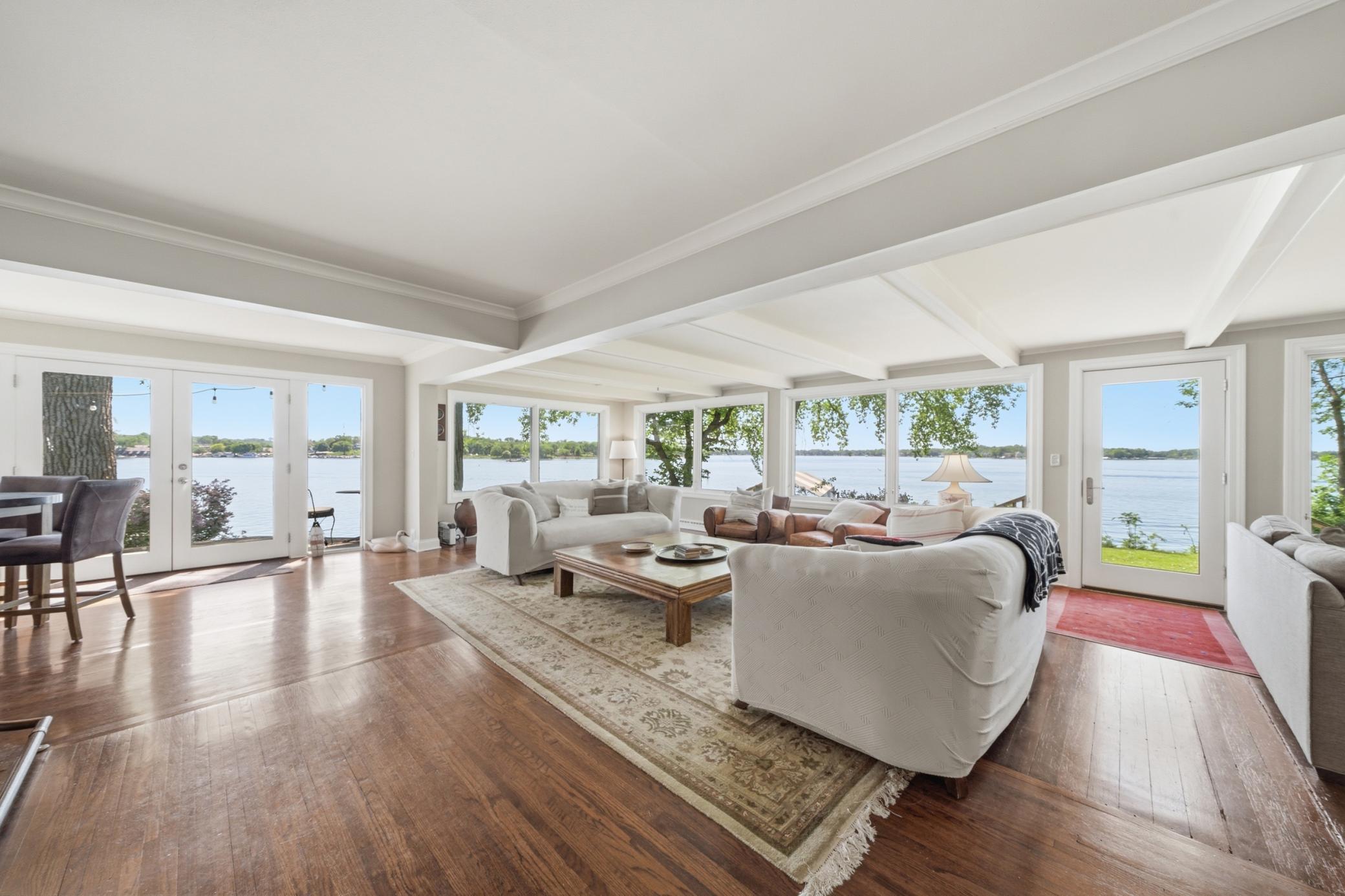 South and west facing lake views, natural hardwood floors, wood burning fireplace