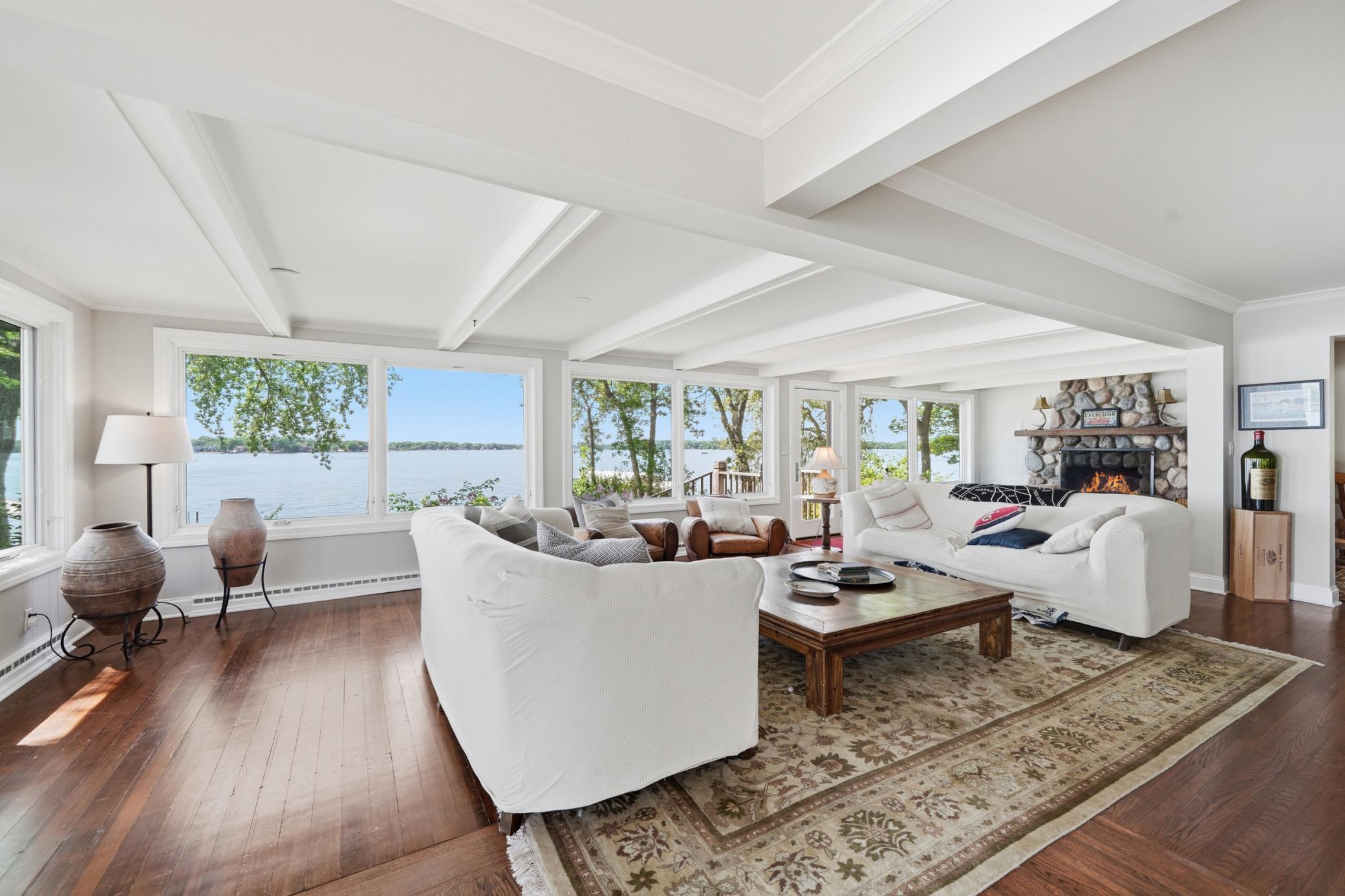 Expansive lake views, fireplace and from your main living room