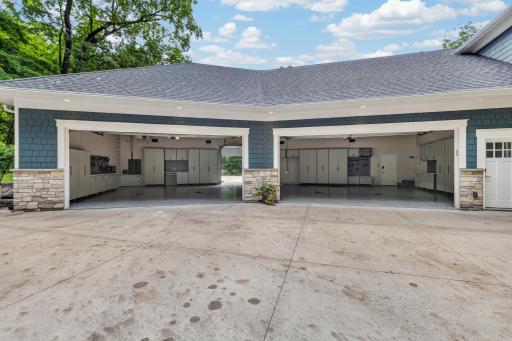 Pair of 18' craftsman paneled, insulated doors. Finished walls and ceilings + heated & floor drains