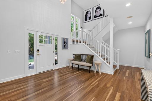 Open staircase and balcony with box newel posts, railing and square balusters