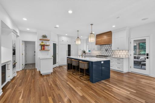 Updated Kitchen w/ full glass patio door access to the screened-in porch