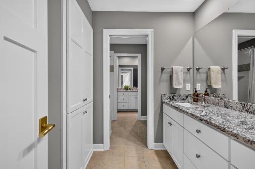 Linen closet and ceramic tile flooring w/ radiant in-floor heating