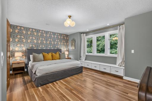 Bedroom 3 features enameled window bench that offers drawer storage