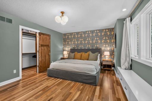 Bedroom 3 features walk-in closet with custom alder organizer & shelving
