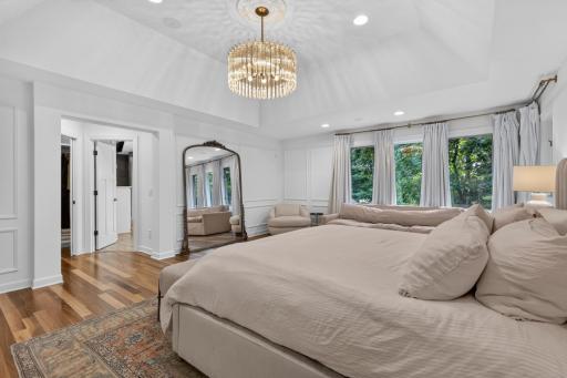 Large windows capture treetop views of the property!