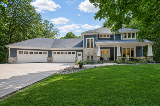 A rare private retreat on 2.49 naturally wooded acres in the desirable Prior Lake / Credit River area.