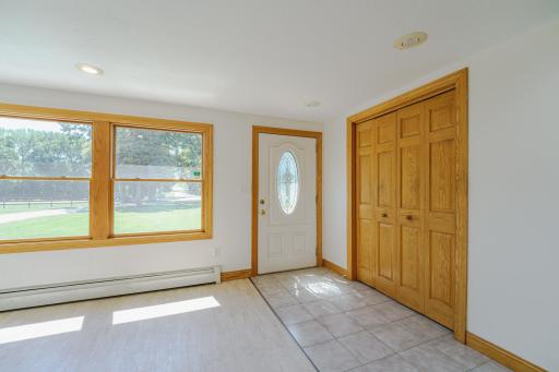 The interior is incredibly light, with a neutral palette throughout. You'll notice sunlight pouring in from nearly every room.