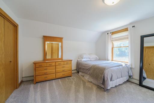 This is one of two upper level bedrooms.