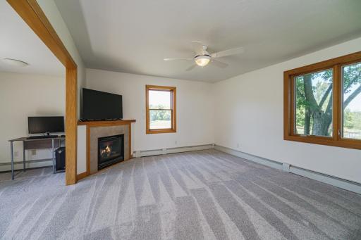 The main floor includes a HUGE bedroom which can also be used as a den. This room has an alcove that is currently open to the front, and it could also be enclosed with closet doors if desired.