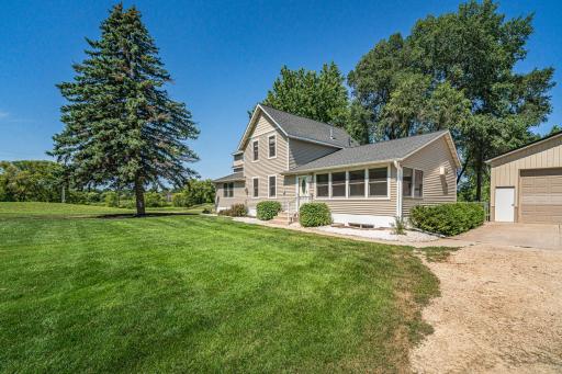 The homesite is picture perfect, with a beautiful yard, new roof and windows, new Premium vinyl siding, and a new poured foundation.