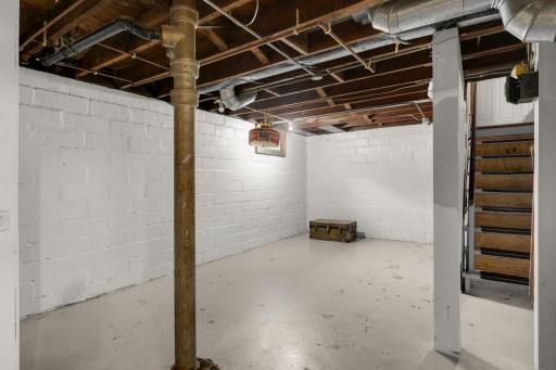 Clean basement offers abundant storage space