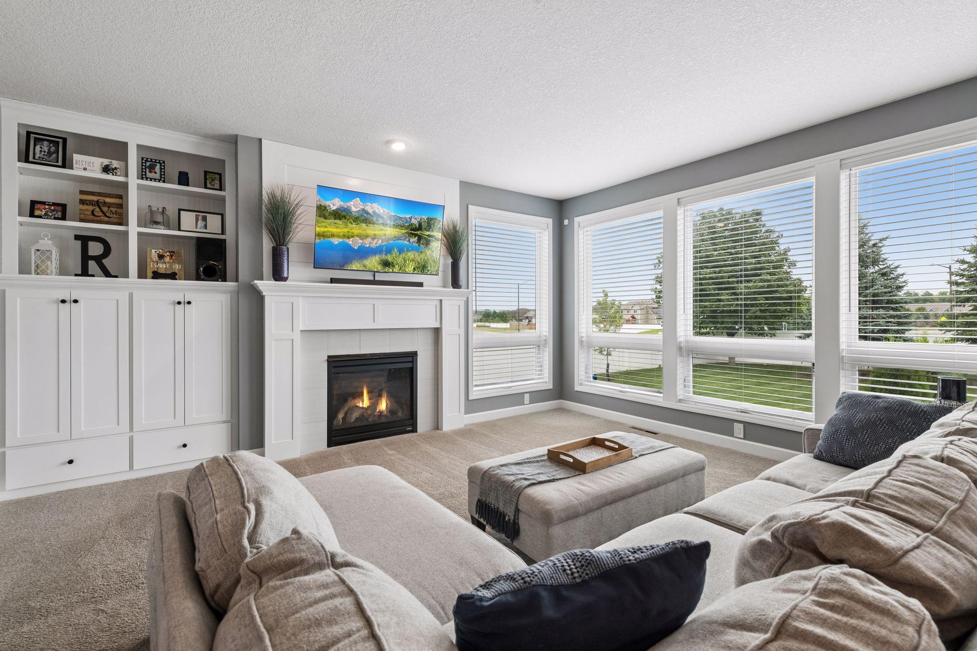 Impressive main level living room with wall of windows!