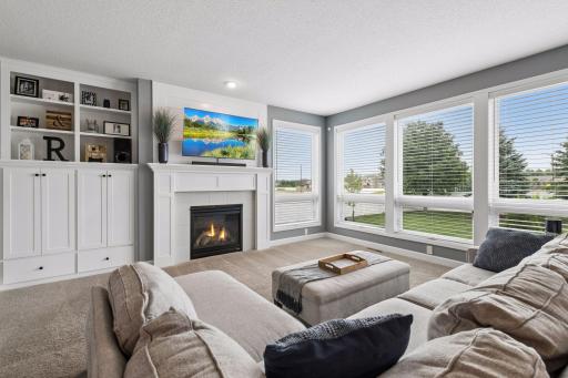 Impressive main level living room with wall of windows!