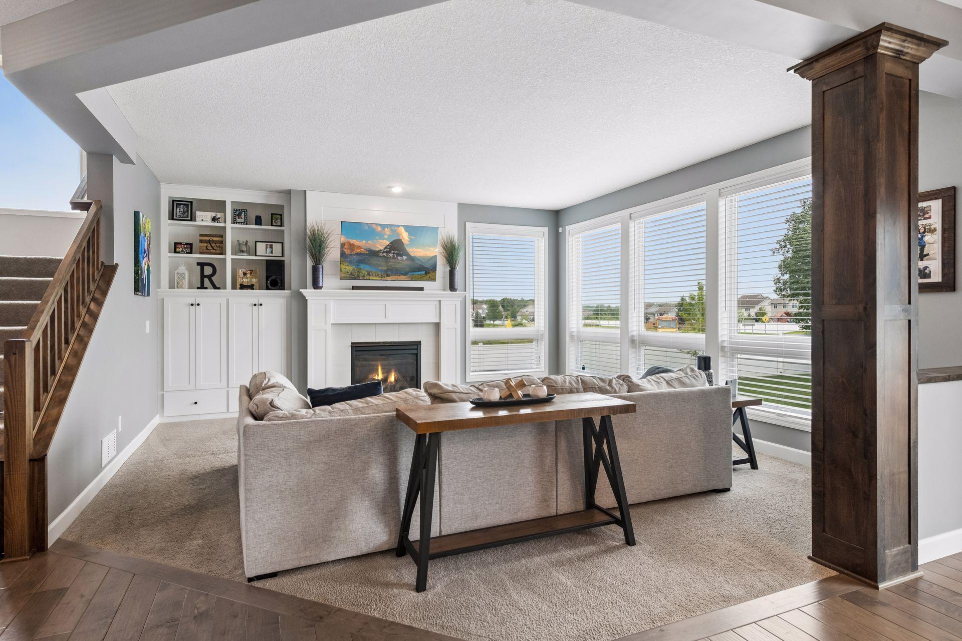 Highlights include a gas fireplace a built-in bookshelves.
