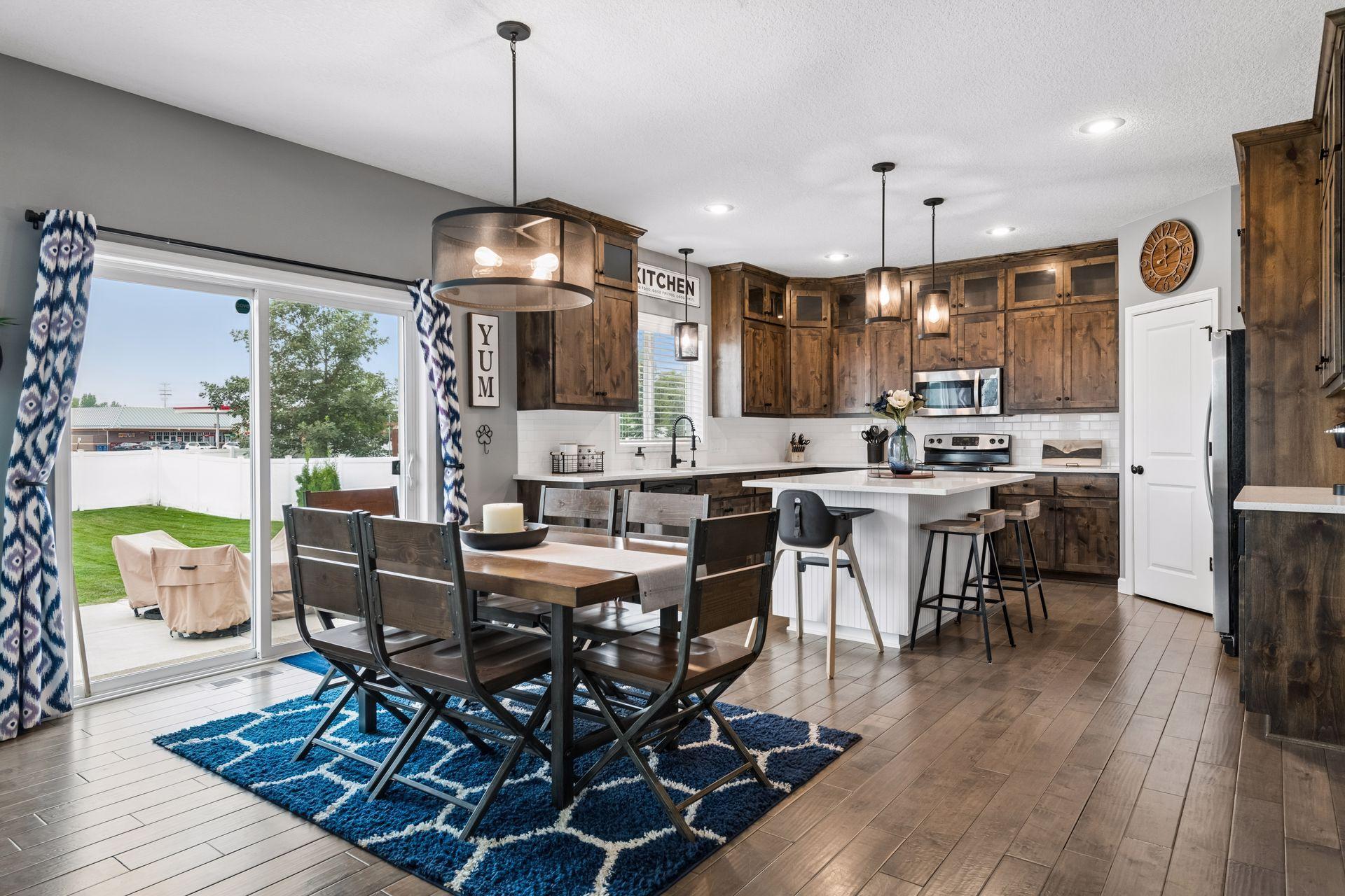 Walk out to patio and large fenced backyard!