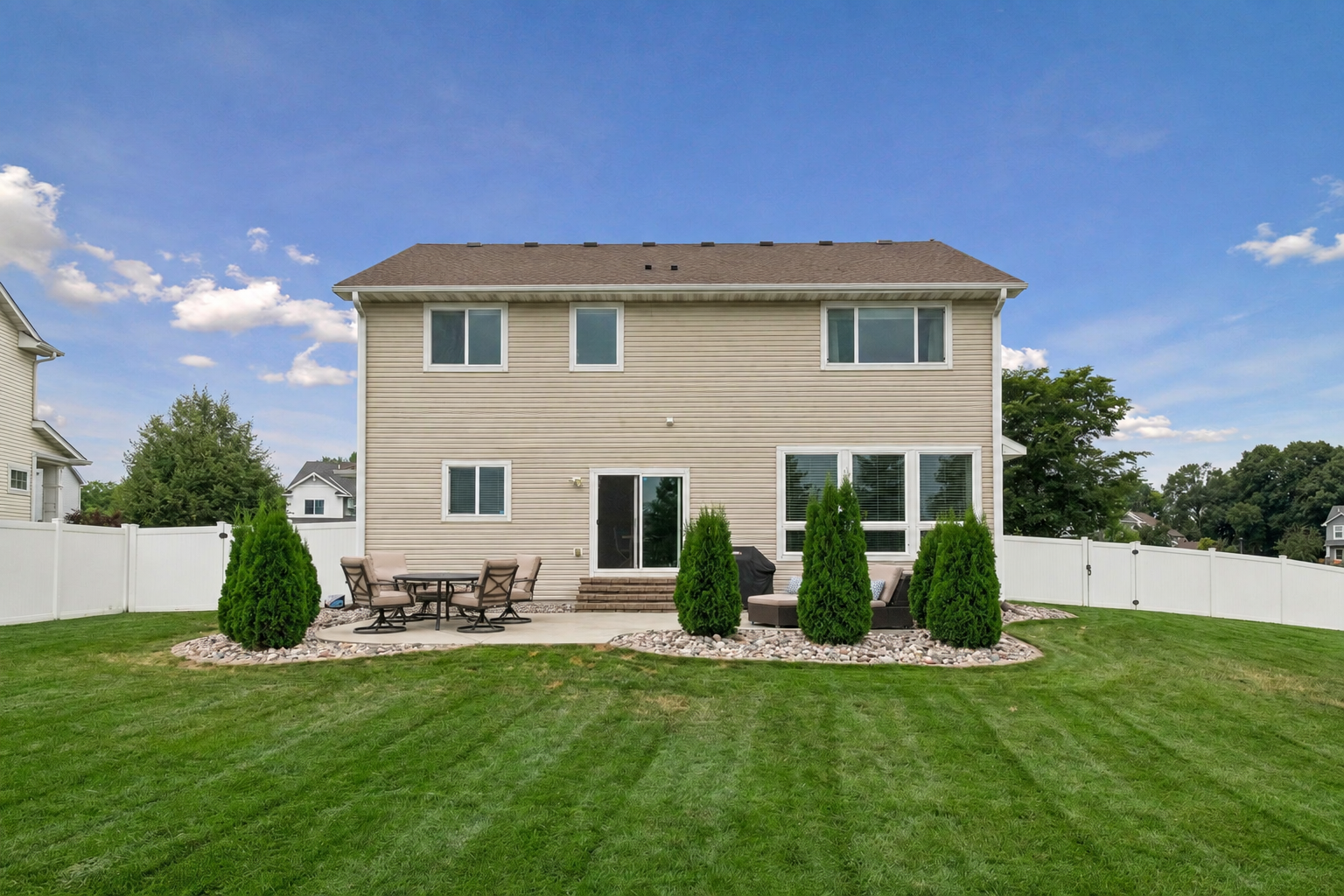 Enjoy your evenings on the large concrete patio and huge fenced backyard!