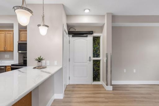 Front door with convenient entry closet.