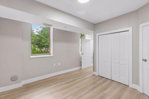 Solid paneled doors throughout. Here is an alternate view of the primary BR showing the closet space.