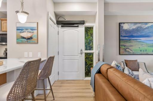 Front door with convenient entry closet.