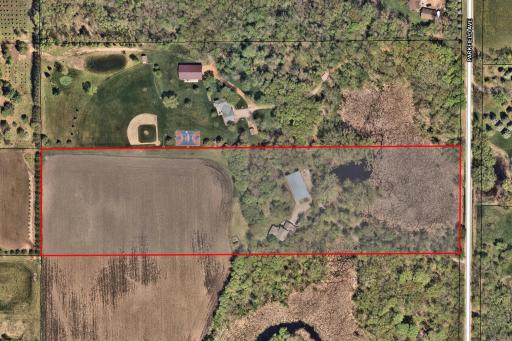 This is an aerial view of the property as you can see the back half of it is currently being rented to a local farmer for crops. You can easily convert this space into a horse property or any other dream you have.