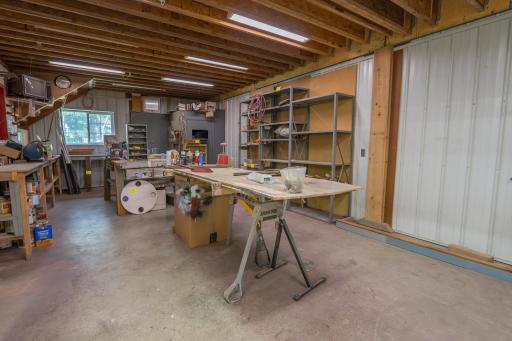 This is on the back end of the shed below the storage. This was currently being used as a machine shop area. The entire shed is divided off into four spaces. Two large areas on the front of the shed and the two back areas including this space