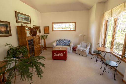This is the front formal living room as you enter the house this is the first room you see off to the right. It could be converted into a Home Office or den whatever your needs may be