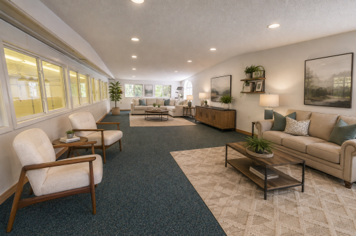 This upper room above the office is a perfect place for the employees to hang out. Or you could turn it into yet another living space extended from the home. The windows on the left overlook the shop, use it as a Home Office as well. Virtually staged