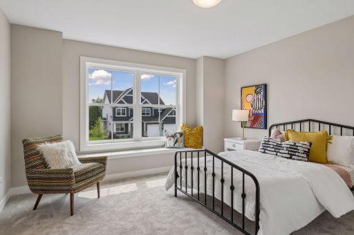 There are three additional bedrooms on the upper level as well as one on the lower level.