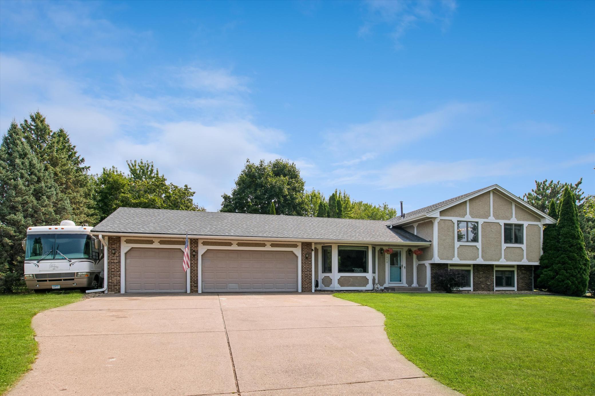 3 car garage + room to park an RV or boat.