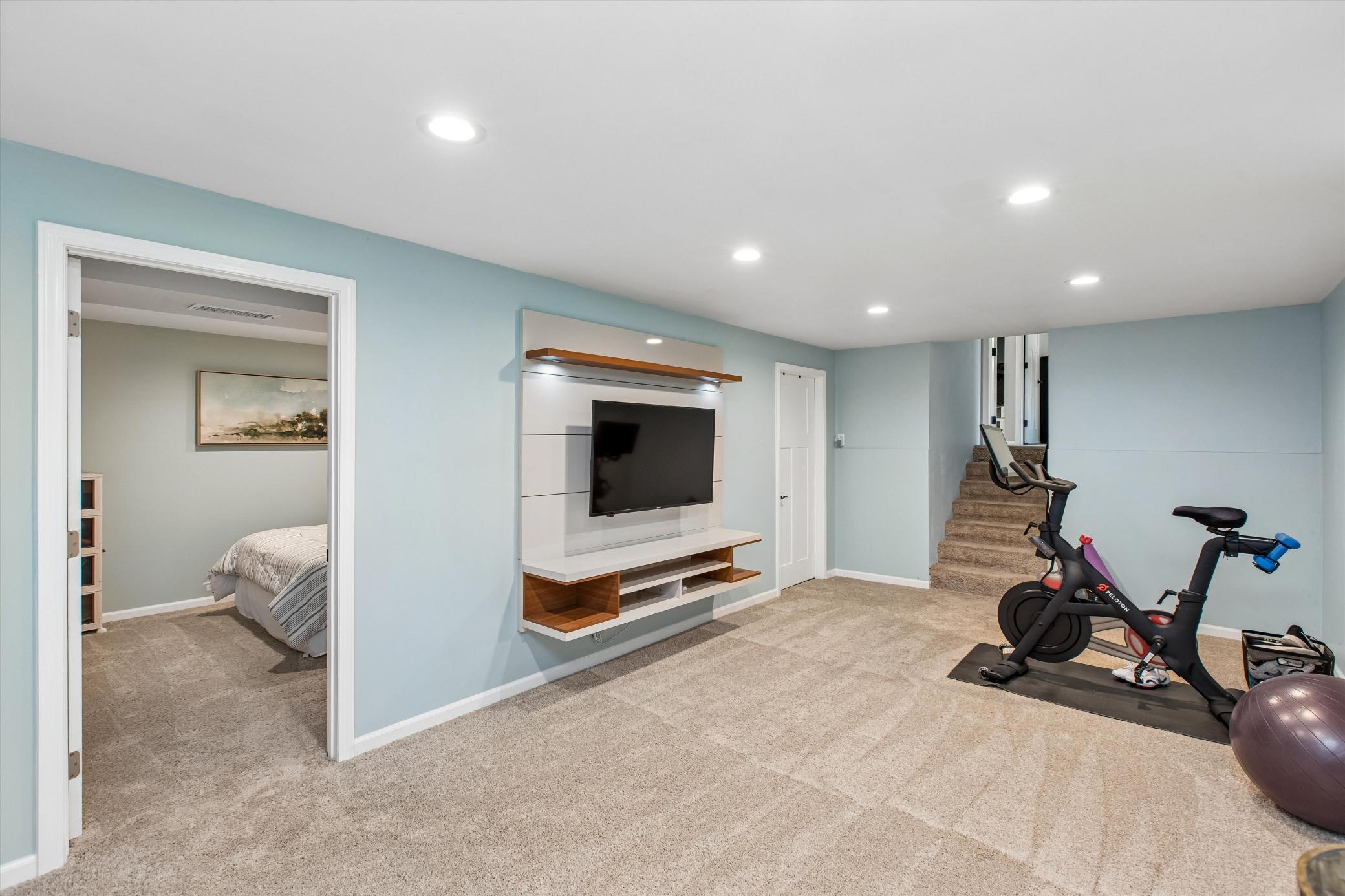 Level 1 amusement room with built-in entertainment center.