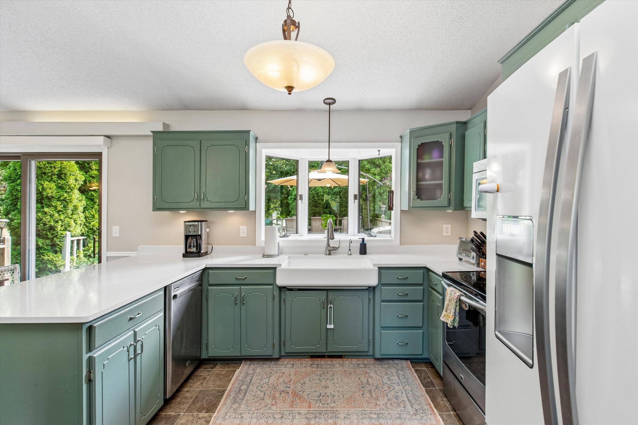 kitchen with farmstyle sink and garden window