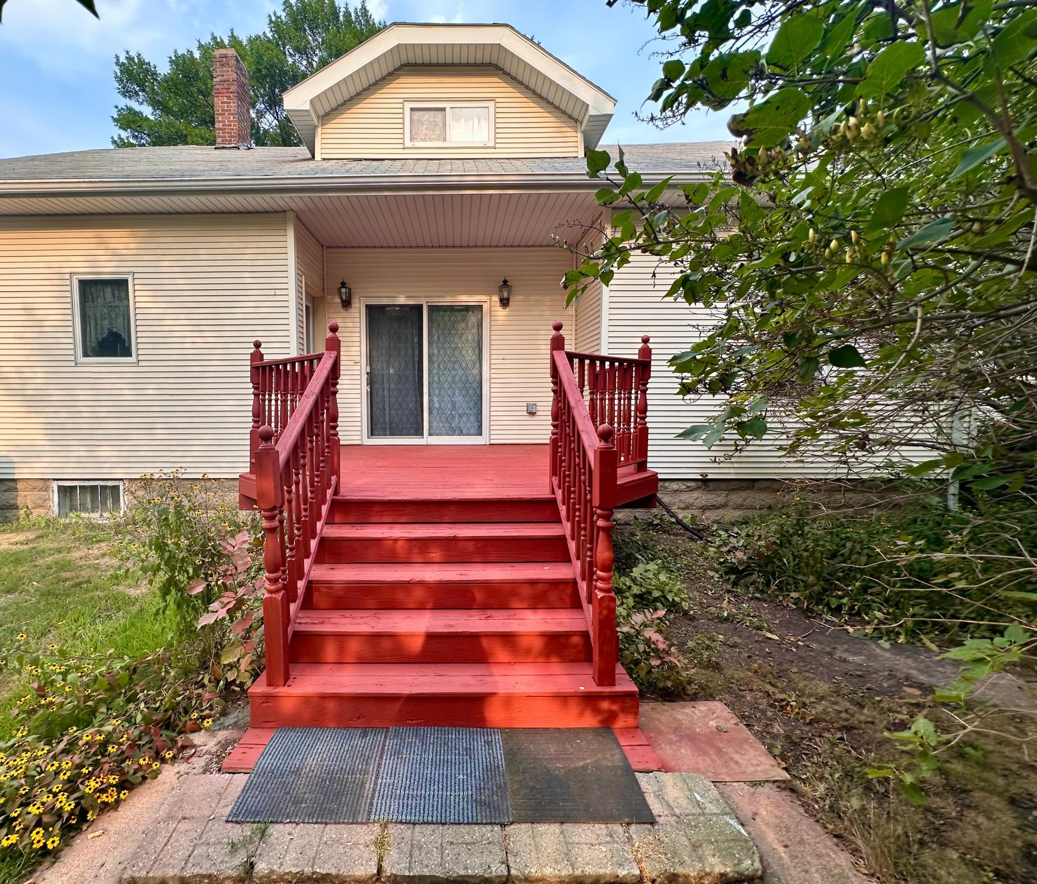 Access to the side deck through the kitchen and/or dining room