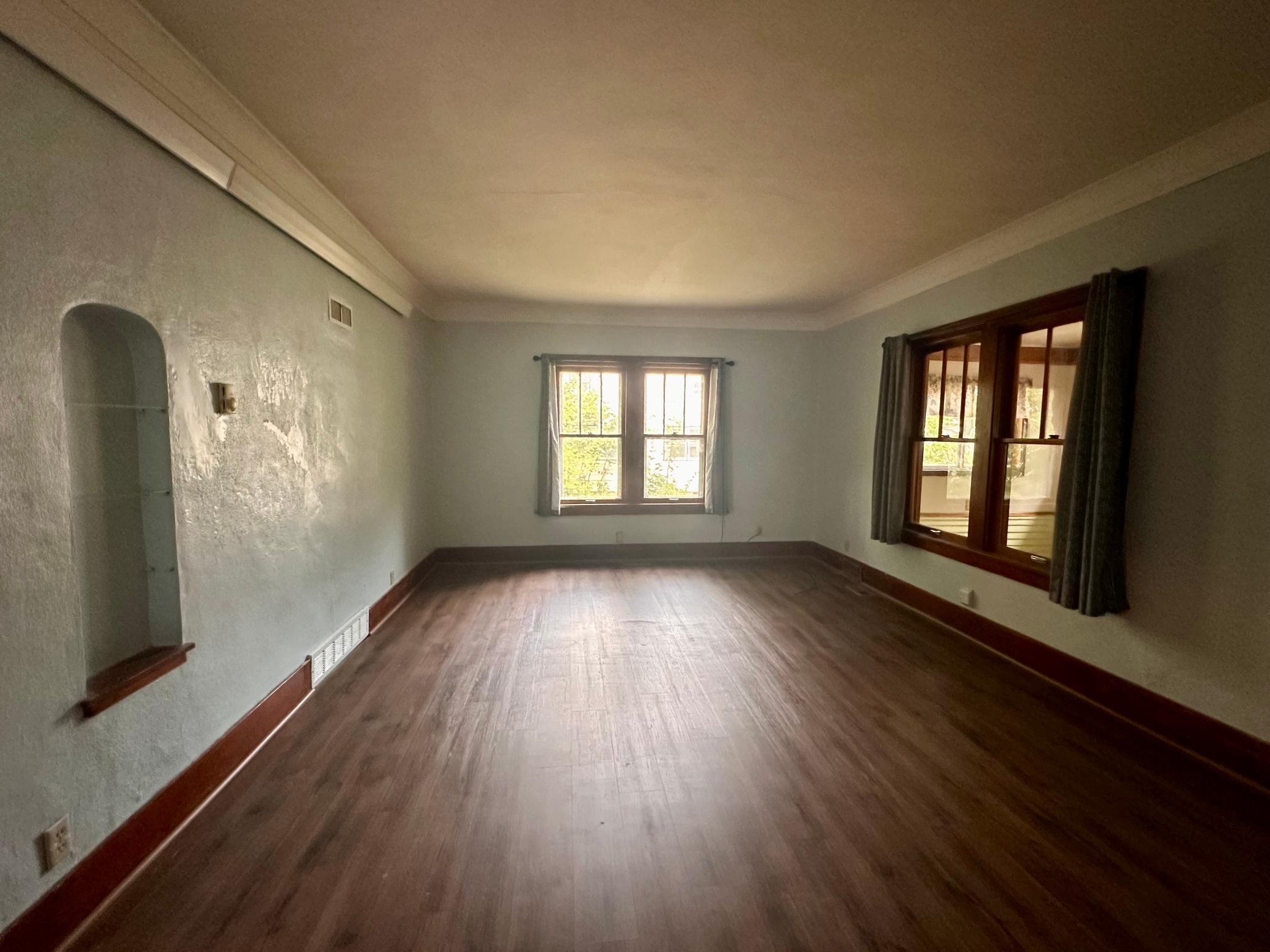 Imagine how you'd place your furniture? Large TV - plenty of wall space - check -- Lots of room for entertaining guests - check.