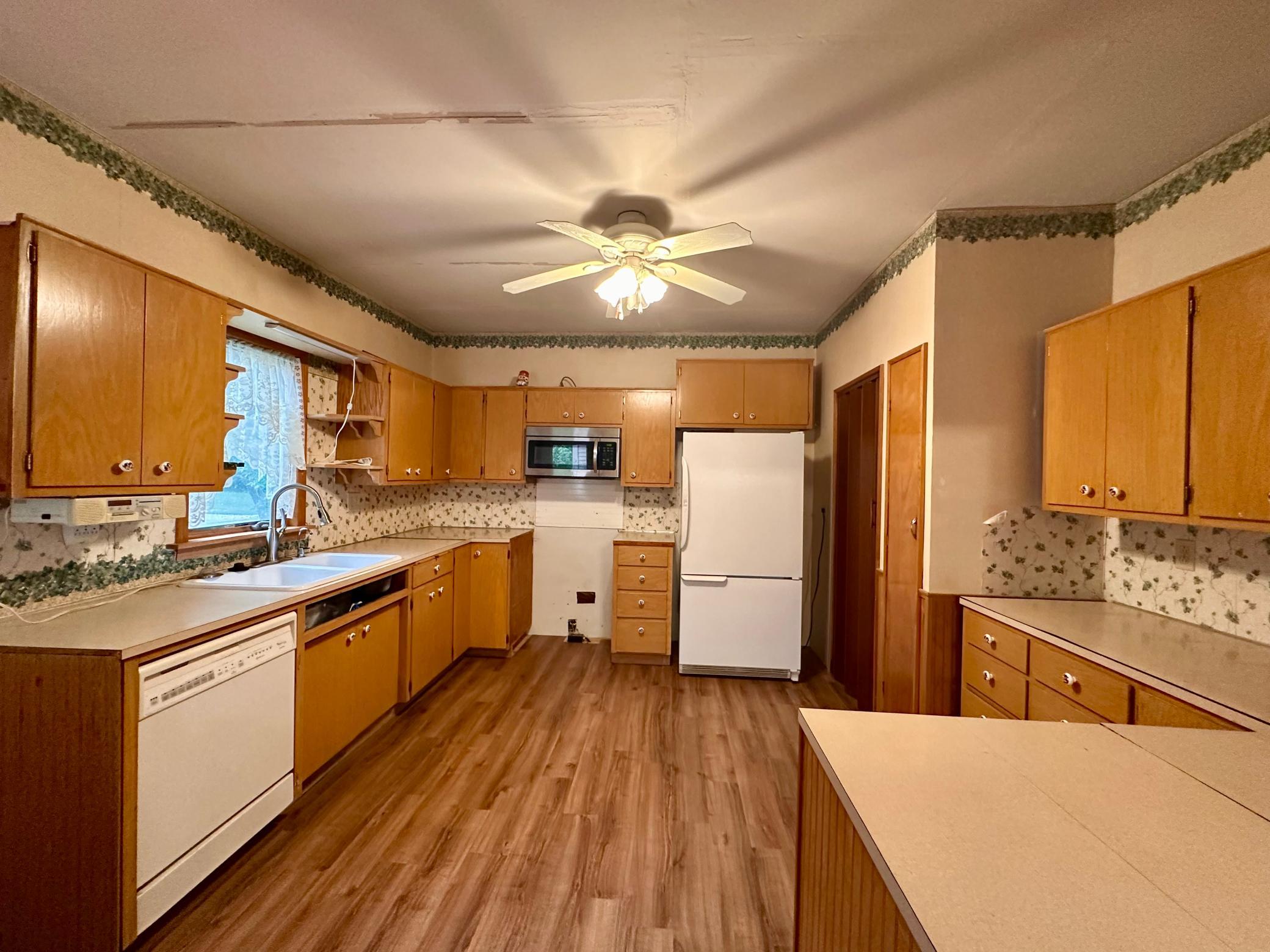 Large kitchen features lots of cabinetry