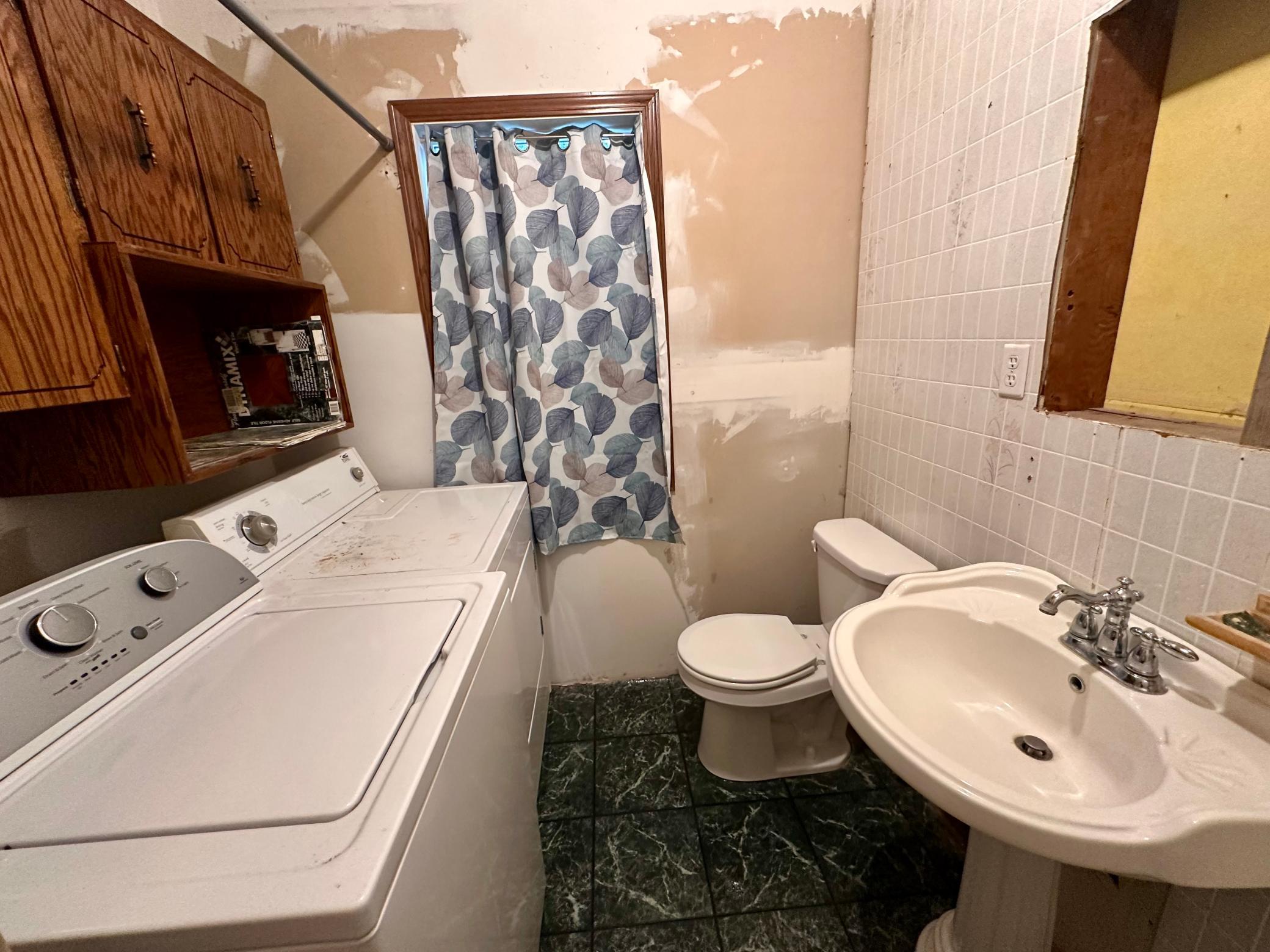 Laundry Room with 2nd toilet on the main floor!