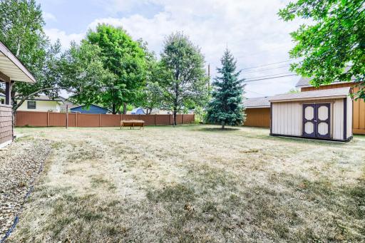 Note the depth of this side yard. Included is the graden shed.