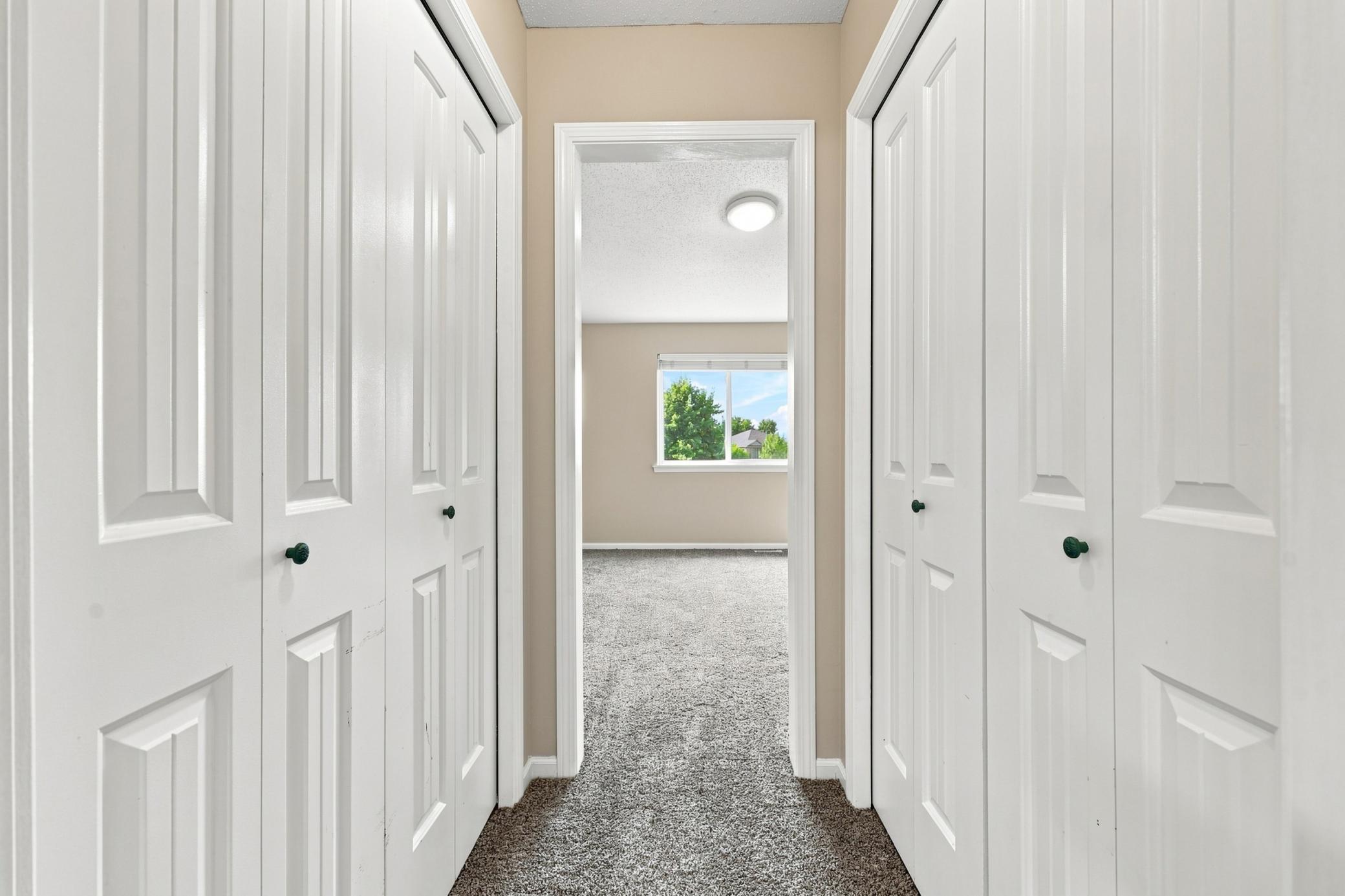 Primary Bedroom Walk-Through Closet