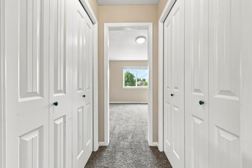 Primary Bedroom Walk-Through Closet