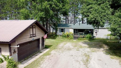 Property entrance with garage and cabin.jpg