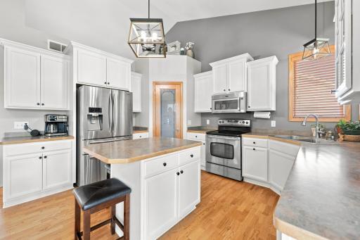 Freshly professionally painted cabinets and other updates