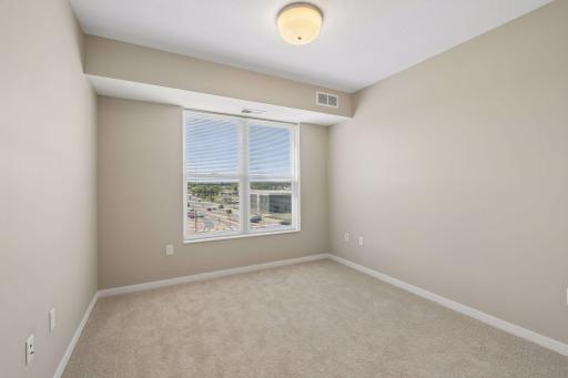 2nd bedroom situated on the opposite side of the unit.