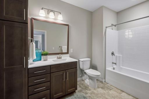 Full bath near living room and 2nd bedroom.