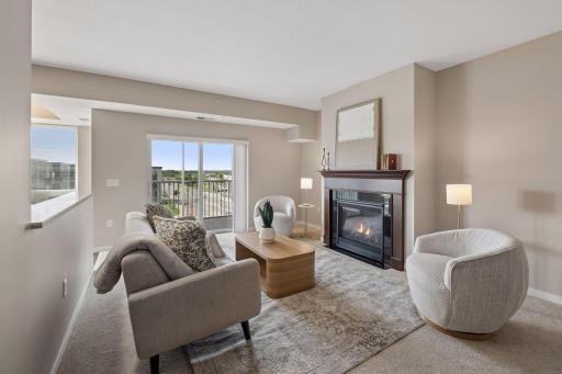 Cozy up to your gas fireplace & enjoy the neutral decor throughout!