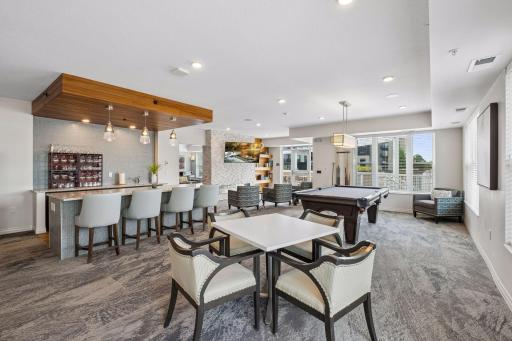 This first floor billiards room is the perfect gathering space with your new friends!
