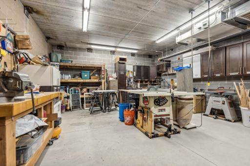 For all the wood workers & crafters, there's a Maker's Studio in the lower level garage.
