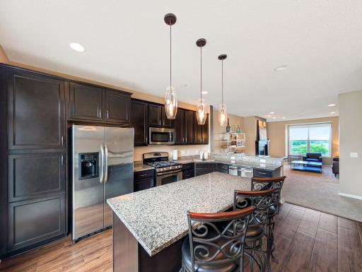 Updated kitchen with stainless steel appliances and tons of natural light!