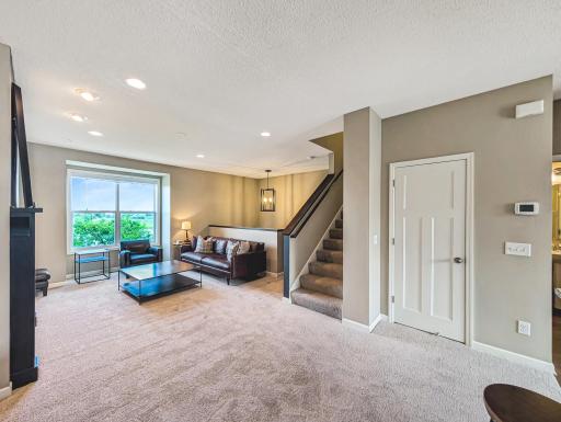 Main level's half bath is just beside the staircase.