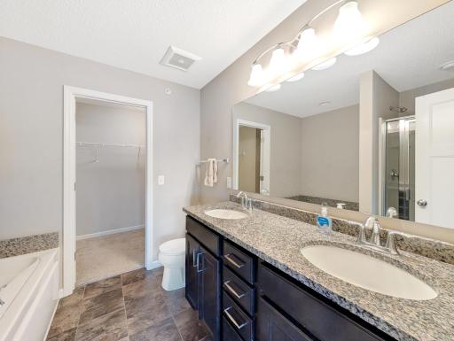 Primary walkthrough bathroom with double vanity!