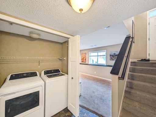 Basement features laundry and a family room!